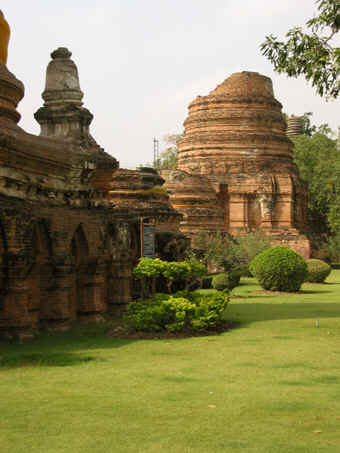 Beautiful green grounds with remains of Stupa, Ayutthaya, Thailand