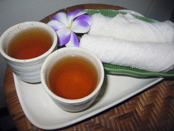 Cups of hot tea and cold towels. Thai massage, Chiang Mai, Thailand