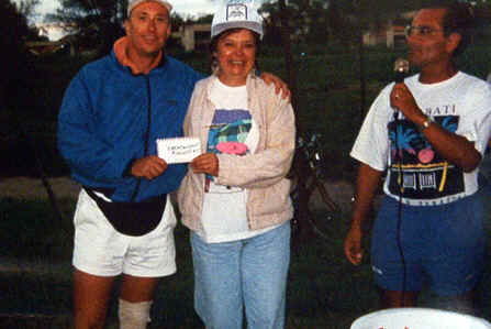 BILLY AND TEAM OWNER, JACKIE,  ACCEPTING HER PROCEEDS FROM RUBEN