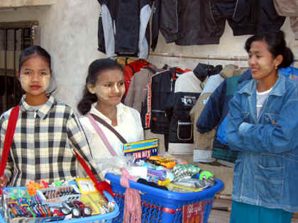 KIDS SELLING ON THE STREET....THIS IS A TYPICAL SIGHT