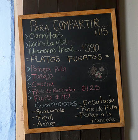 Chalk board daily special menu La Popular Restaurant, Oaxaca, Mexico