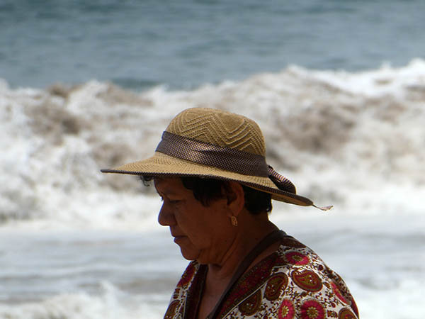 Mama wears a beach hat, Chacala, Mexico