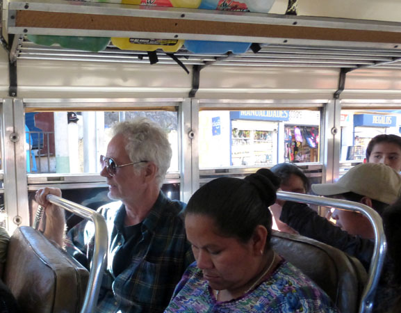 Bill riding a chicken bus to Solola 