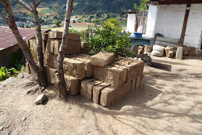Hardened mud bricks piled high