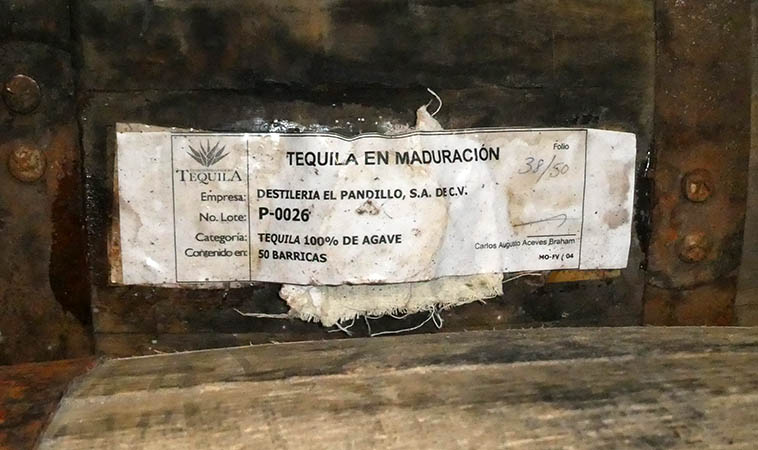 Contents of a tequila aging barrel, Jalisco, Mexico