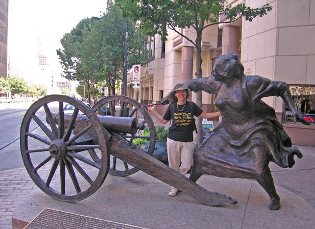  a bronze statue honoring Angelina Eberly who fought for Austin to remain the capital of Texas in 1842