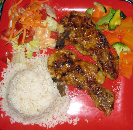Patty's dinner plate of chicken and rice. Corozal, Belize