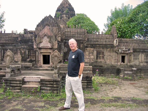 Dale in front of Khmer ruins in Asia