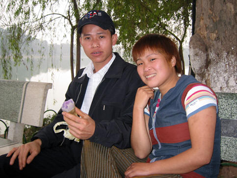 YOUNG LOVERS AT HOAN KIEM LAKE