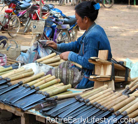 TRANSMUTED  U.S.  STEEL into knives, Luang Prabang, Laos