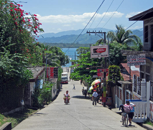 Main street in humble, historic La Buga leads straight to the sea
