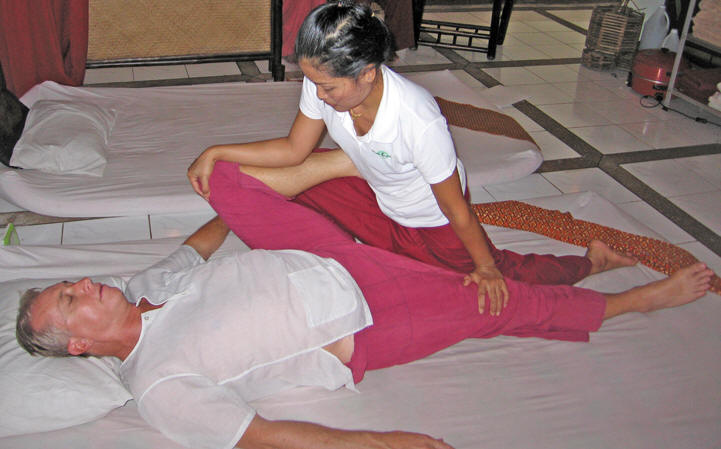 May opening up Billy's hip joints. Chiang Mai, Thailand