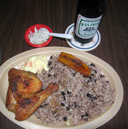 Another Belizean Chicken-with-rice-and-beans meal. The fried plantain is a good contrast flavor. Orangewalk, Belize