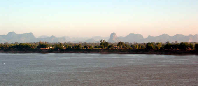 THE MOUNTAINS OF LAOS ACROSS THE MEKONG RIVER FROM NAKHON PRANOM