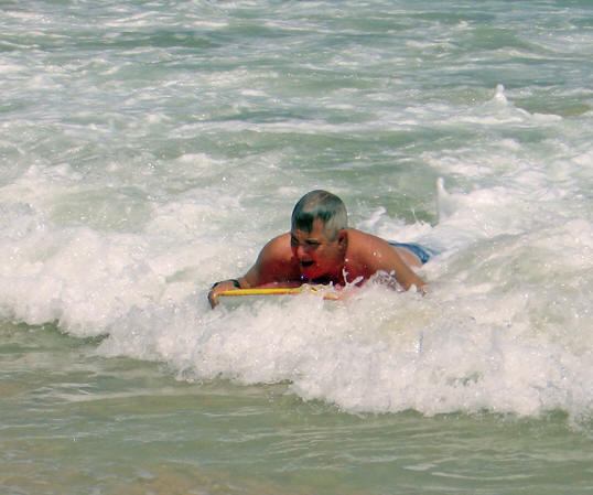 Paul coming in hard from a big wave on his boogie board 