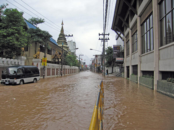 The entire business district is flooded again, with mounting costs to owners. Chiang Mai Floods,  Thailand