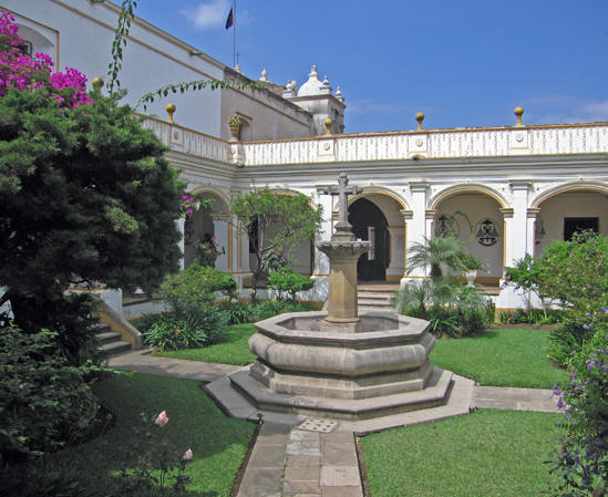 Central fountain surrounded by gardens found in upscale Spanish style homes