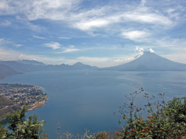 Panajachel is the city shown in the left of this photo of Lake Atitlan. 
