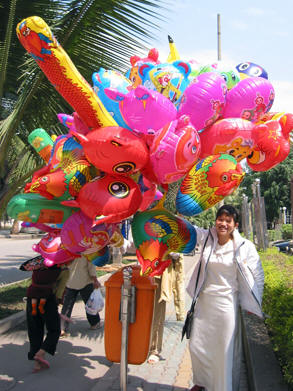 Vendors sell Colorful balloons everywhere! Jinghong, China