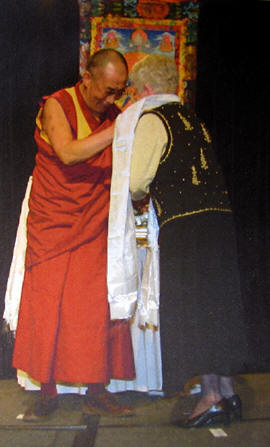 Dalai Lama giving prayer shawl to Penny