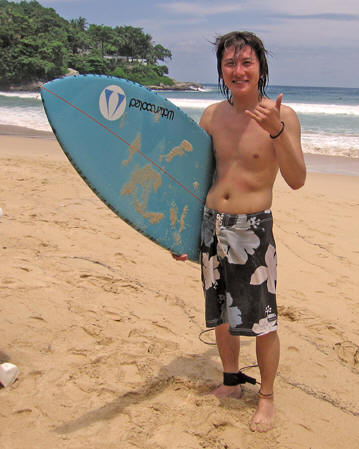 Young surfer at Kata Beach