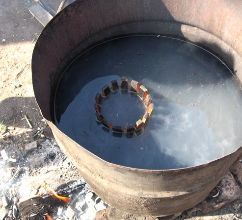 Barrel strips softening in hot water